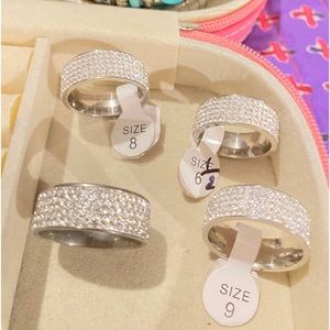 FOUR BEAUTIFUL BLING RINGS